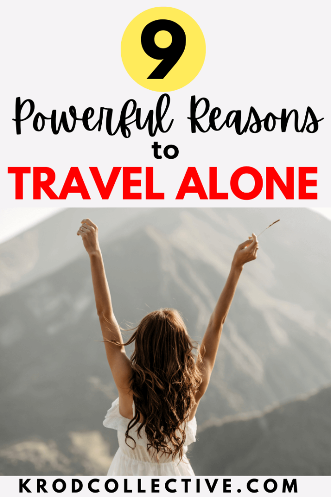 A woman standing with her arms raised, looking out over a mountain landscape, symbolizing the freedom and empowerment of solo travel. The image is accompanied by bold text that reads, '9 Powerful Reasons to Travel Alone,' highlighting the many benefits of traveling alone, including personal growth, independence, and unforgettable experiences.