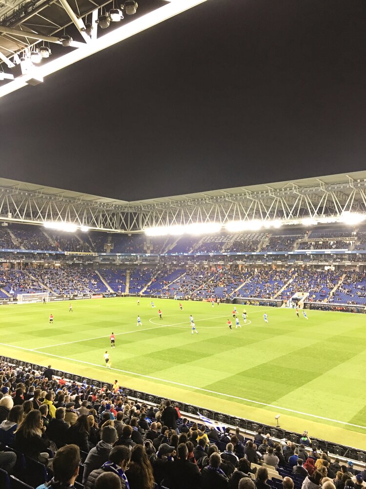Crowded RCDE Stadium in Barcelona Spain during game at night