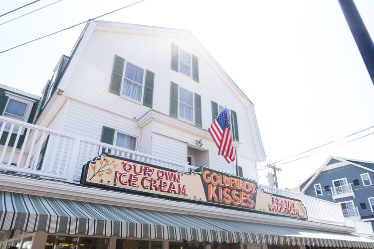 Goldenrod Ice Cream Store front with American Flag on a sunny day in York Maine