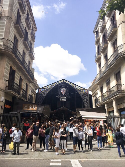 Large crowd outside of Boqueria Market in Barcelona in the afternoon