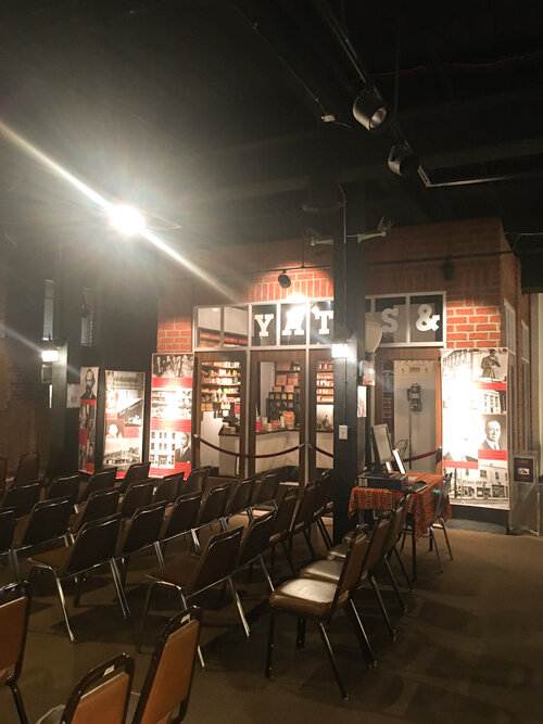 Main room at the Black History Apex Museum with many empty chairs