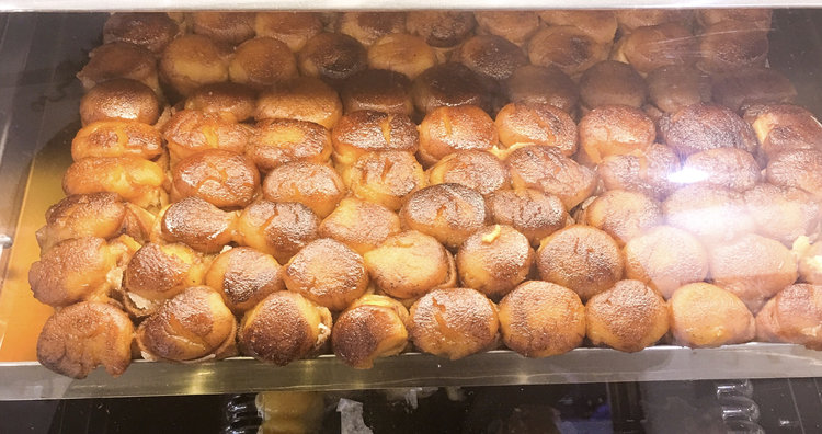 Sheet of piononos in a bakery in Granada Spain. Perfect for any Granada travel guide.
