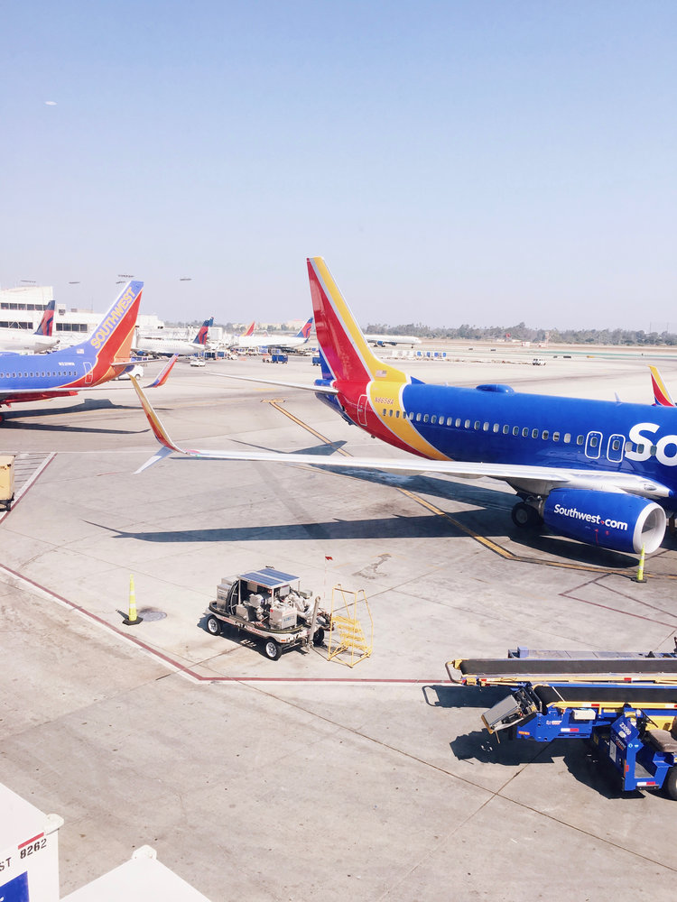 Southwest Airlines planes waiting on airport tarmac