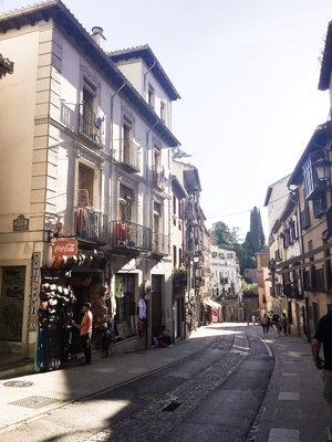 The narrow cobble streets of Granada Spain in Europe on a sunny day