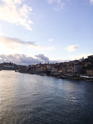 The views of Porto Portugal in Europe from across the Douro River on a sunny day