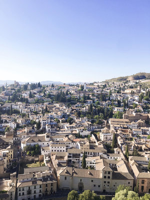 The views of white houses with brown roofs in Granada Spain in Europe