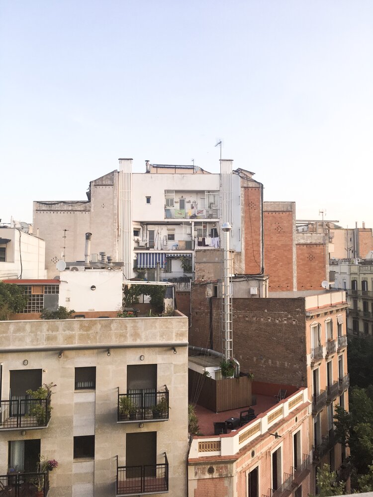 Views of apartment rooftops in Barcelona on a sunny day