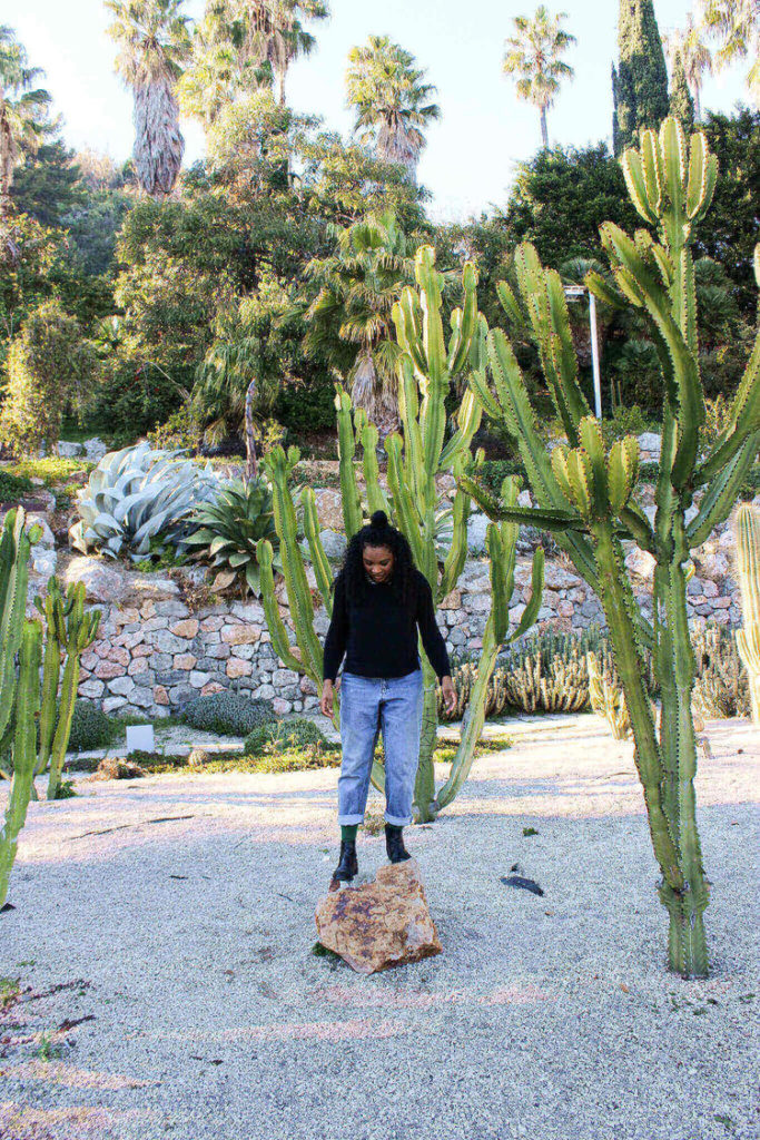 Kim standing on a small rock in the cactus farm in Barcelona-2