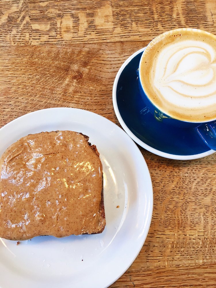 Thick almond butter toast and cappuccino at The Mill in San Francisco California