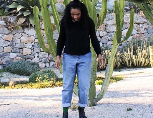 Kim standing in the cactus farm in Barcelona Spain on a sunny day