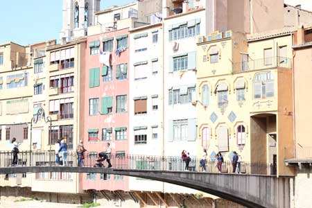 Colorful facade and bridge in Girona Spain day trip from Barcelona