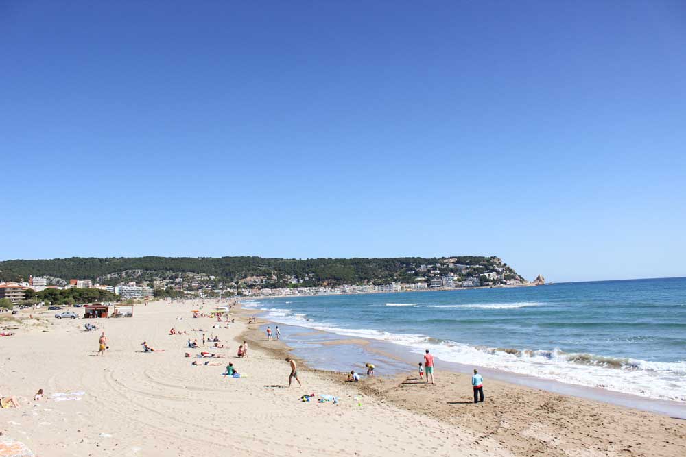 Locals enjoying the beach in Costa Brava in Catalonia Spain